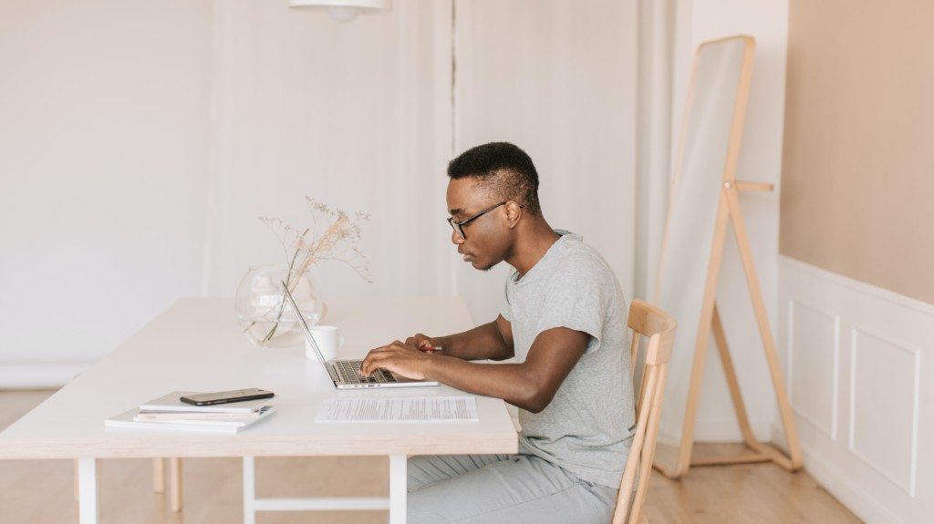Procurement professional using digital tools on his computer