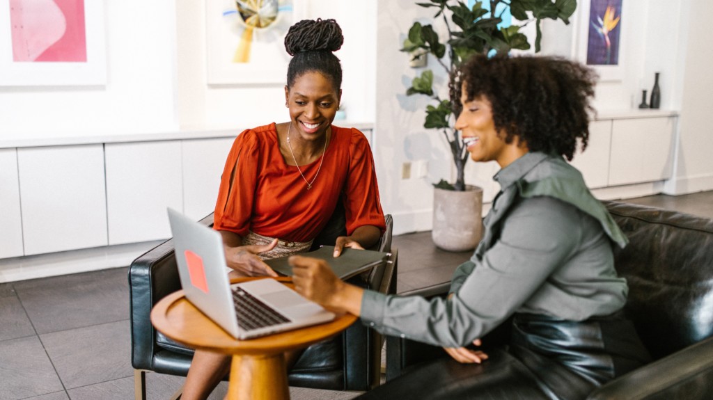 Two procurement professionals collaborating on requests using Bonfire Intake