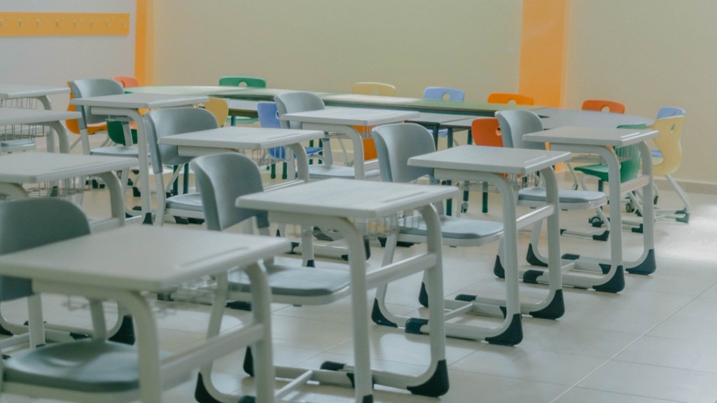 Rows of desks in K-12 classroom