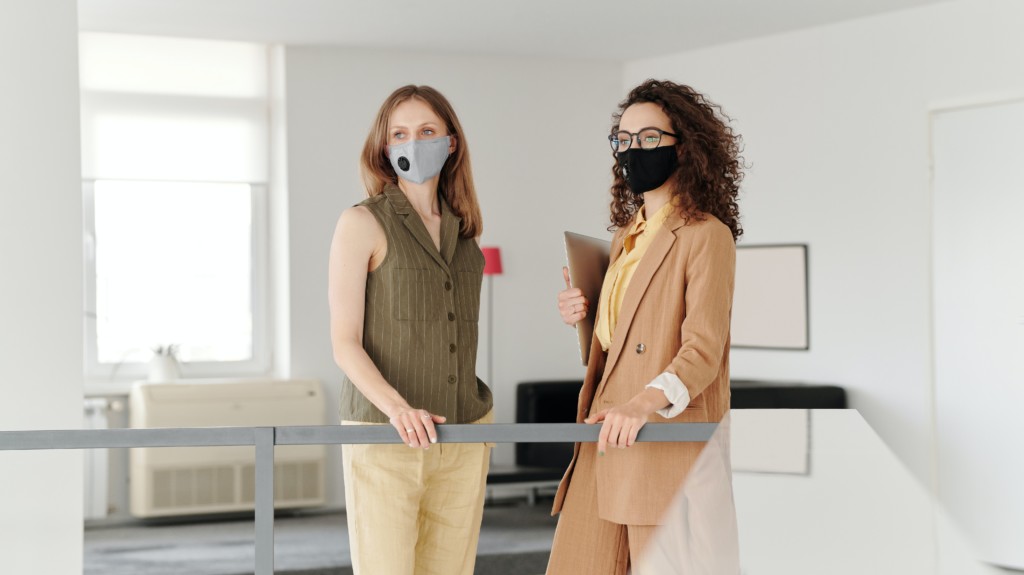 Procurement professionals wearing masks