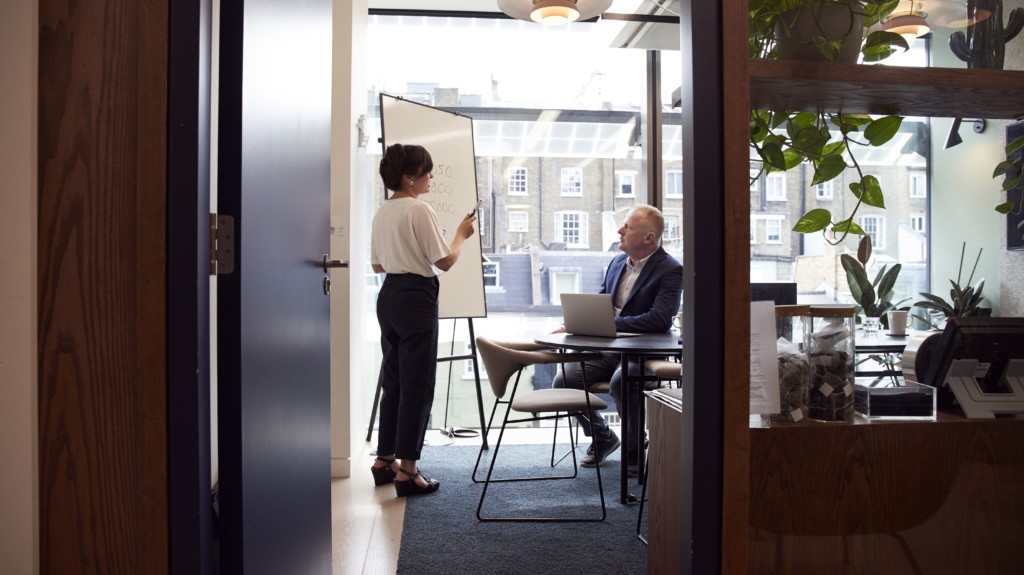 Procurement professionals collaborating and sharing resources
